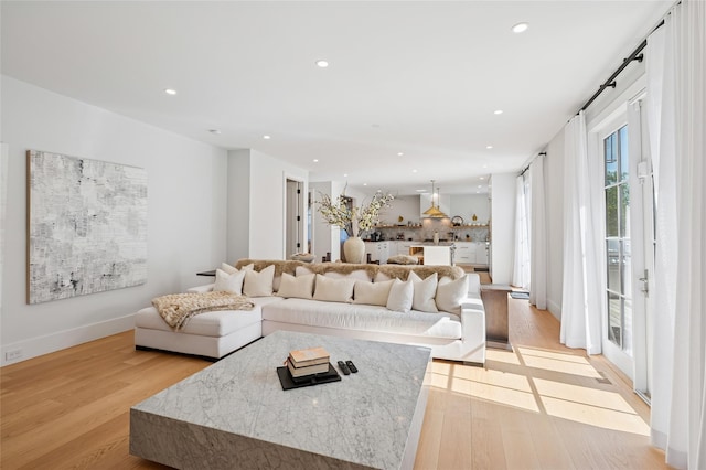 5 Kings Ln, Southampton, NY 11968 - living area with light wood-type flooring and recessed lighting