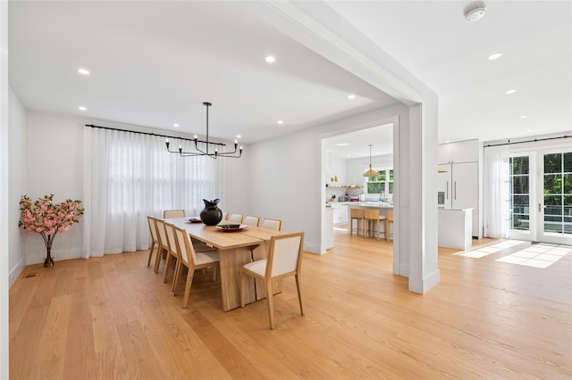 5 Kings Ln, Southampton, NY 11968 - dining area with a chandelier, recessed lighting, and light wood-style flooring