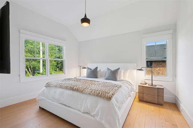 5 Kings Ln, Southampton, NY 11968 - bedroom featuring vaulted ceiling and light wood finished floors