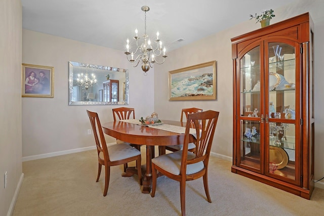 30 Windsor Cir Unit 30, New City, NY 10956 - dining space featuring a chandelier and light colored carpet