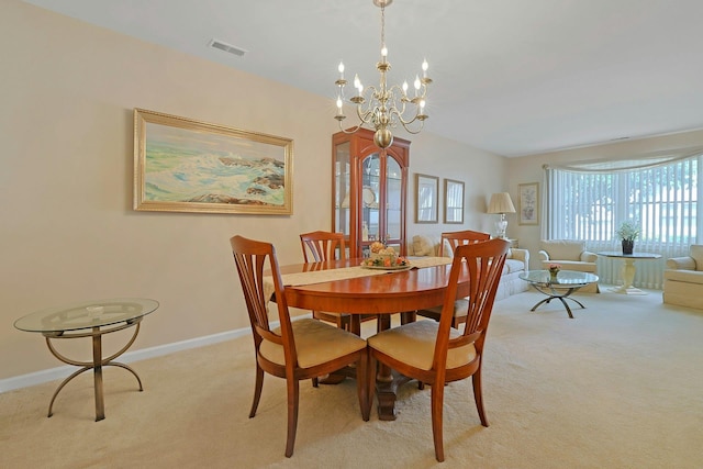 30 Windsor Cir Unit 30, New City, NY 10956 - dining area with light carpet and a chandelier