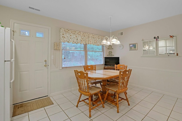 30 Windsor Cir Unit 30, New City, NY 10956 - dining room featuring light tile patterned floors and a chandelier