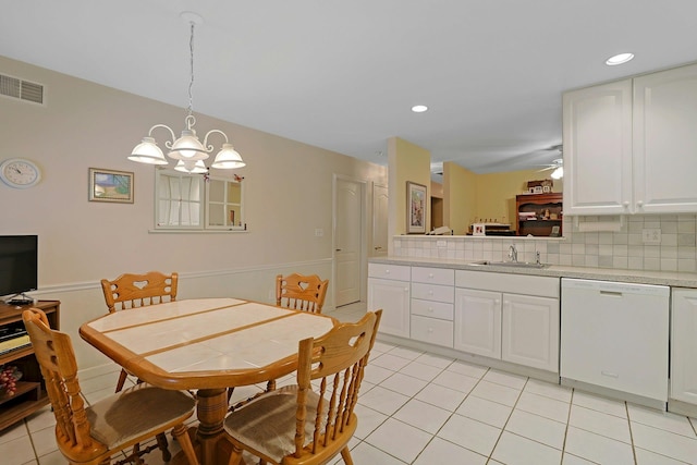 30 Windsor Cir Unit 30, New City, NY 10956 - dining room with light tile patterned floors, a chandelier, a ceiling fan, and recessed lighting