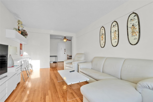 139-09 28th Rd Unit 6F, Flushing, NY 11354 - living area featuring ceiling fan and light wood-style floors