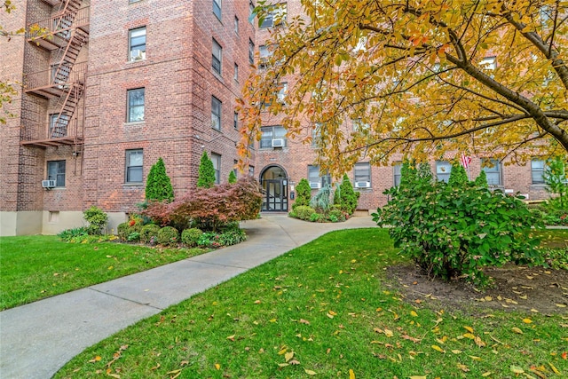 139-09 28th Rd Unit 6F, Flushing, NY 11354 - view of home's community featuring a lawn