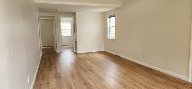 344 Elm Rd W, Mastic Beach, NY 11951 - spare room featuring healthy amount of natural light and light wood-style flooring