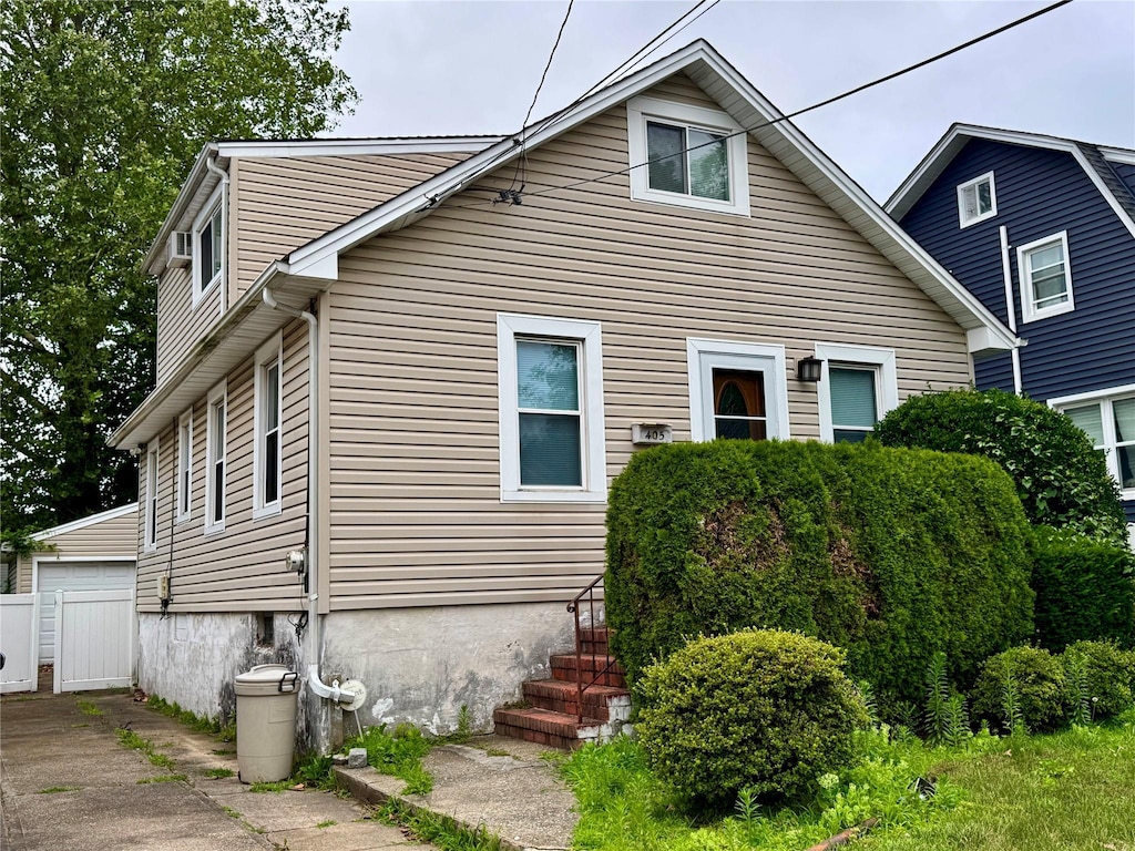 405 Hamilton Ave, Hewlett, NY 11557 - view of front of house with an outdoor structure