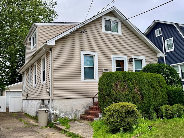 405 Hamilton Ave, Hewlett, NY 11557 - view of front of house with an outdoor structure