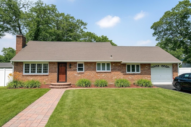 61 Ulster Ave, West Babylon, NY 11704 - ranch-style home with an attached garage, a chimney, brick siding, driveway, and roof with shingles