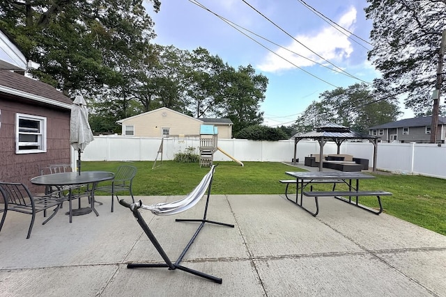 61 Ulster Ave, West Babylon, NY 11704 - fenced backyard with a gazebo, a patio area, outdoor dining area, and outdoor lounge area