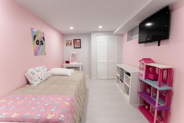 61 Ulster Ave, West Babylon, NY 11704 - bedroom with recessed lighting, a closet, and light wood-type flooring