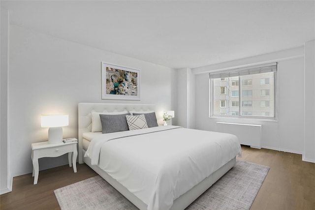 3333 Henry Hudson Pkwy W Unit 4M, Bronx, NY 10463 - bedroom featuring radiator and wood finished floors