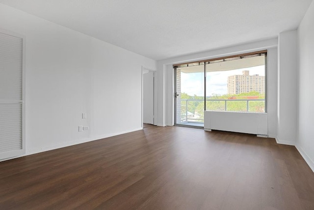 3333 Henry Hudson Pkwy W Unit 4M, Bronx, NY 10463 - unfurnished room with dark wood-style flooring and baseboards