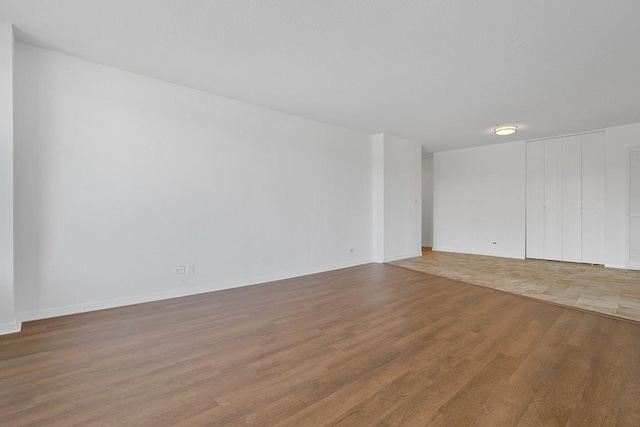 3333 Henry Hudson Pkwy W Unit 4M, Bronx, NY 10463 - unfurnished room featuring wood finished floors and baseboards