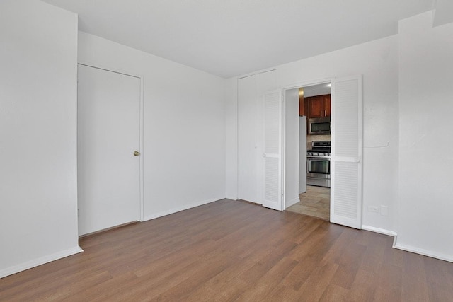 3333 Henry Hudson Pkwy W Unit 4M, Bronx, NY 10463 - spare room featuring dark wood-style floors and baseboards