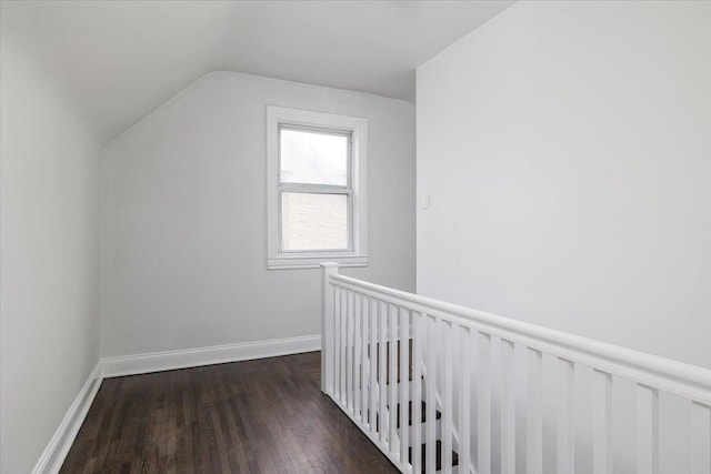 22324 Murdock Ave, Queens Village, NY 11429 - additional living space featuring dark wood finished floors and vaulted ceiling
