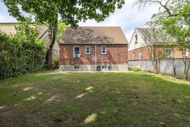 22324 Murdock Ave, Queens Village, NY 11429 - rear view of property featuring brick siding and a shingled roof