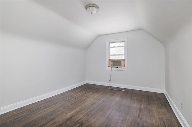 22324 Murdock Ave, Queens Village, NY 11429 - additional living space with cooling unit, dark wood-style flooring, and lofted ceiling