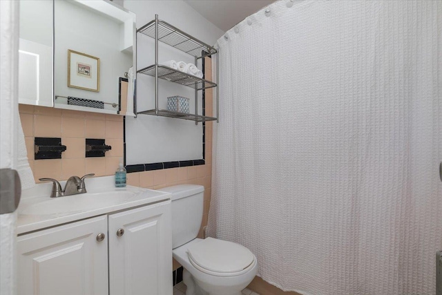 22324 Murdock Ave, Queens Village, NY 11429 - full bathroom featuring tile walls, vanity, and curtained shower