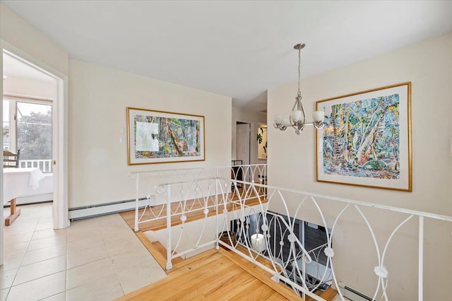25 Amapola Ln, Kings Park, NY 11754 - corridor with a baseboard radiator, a chandelier, and tile patterned flooring