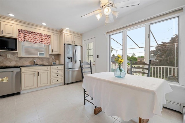 25 Amapola Ln, Kings Park, NY 11754 - kitchen featuring appliances with stainless steel finishes, cream cabinets, dark countertops, and recessed lighting