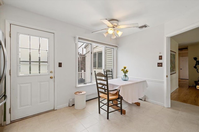 25 Amapola Ln, Kings Park, NY 11754 - dining room featuring ceiling fan, baseboard heating, and light tile patterned floors