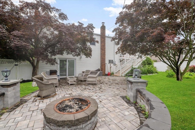 25 Amapola Ln, Kings Park, NY 11754 - view of patio with stairway and an outdoor living space with a fire pit