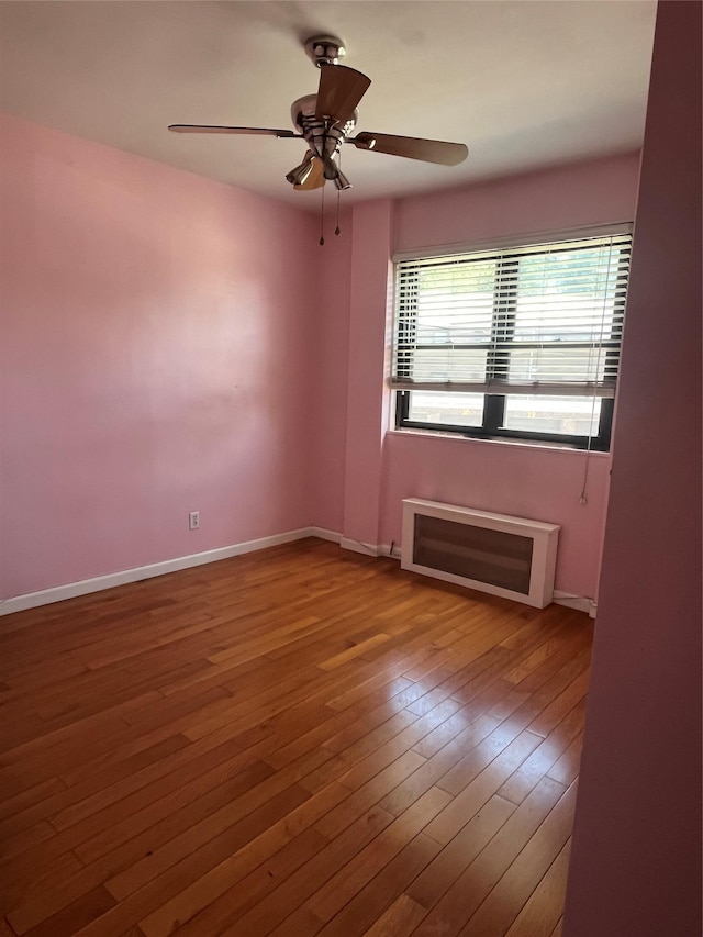 90-32 153rd Ave Unit 0029, Howard Beach, NY 11414 - empty room with ceiling fan and hardwood / wood-style floors
