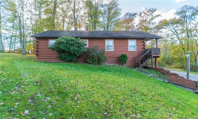 9 Low Rd, Wallkill, NY 12589 - view of side of property featuring log exterior, stairs, a lawn, and a chimney
