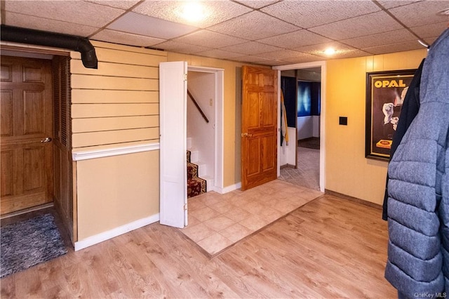 9 Low Rd, Wallkill, NY 12589 - finished below grade area featuring light wood-type flooring, stairs, and a drop ceiling