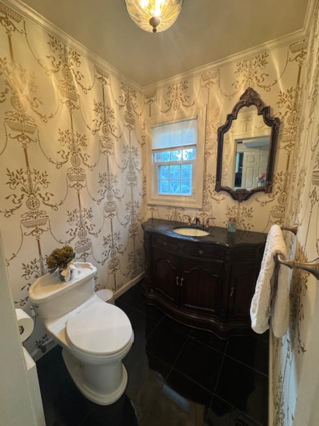 987 E Prospect St, Woodmere, NY 11598 - bathroom with vanity, wallpapered walls, ornamental molding, and tile patterned floors
