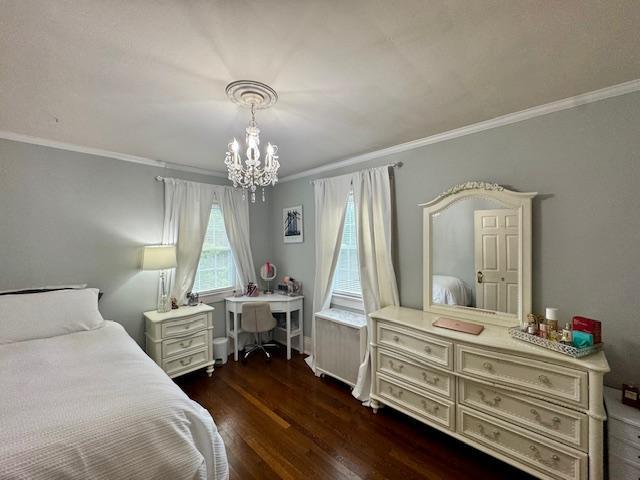 987 E Prospect St, Woodmere, NY 11598 - bedroom with a chandelier, wood finished floors, and ornamental molding