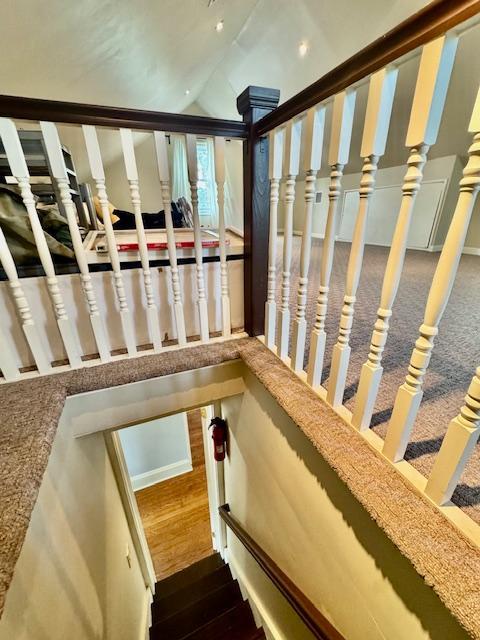 987 E Prospect St, Woodmere, NY 11598 - stairs with wood-type flooring, lofted ceiling, and recessed lighting
