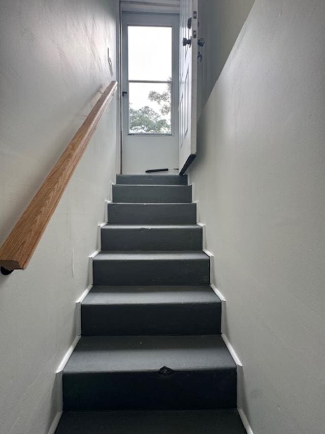 987 E Prospect St, Woodmere, NY 11598 - stairs featuring baseboards