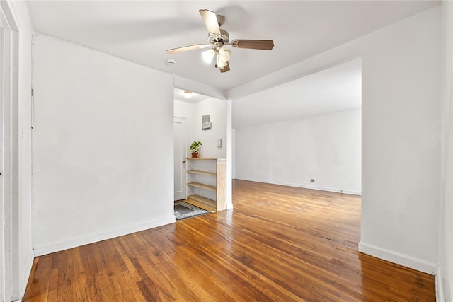147-25 38th Ave Unit F26, Flushing, NY 11354 - empty room with ceiling fan and hardwood / wood-style floors