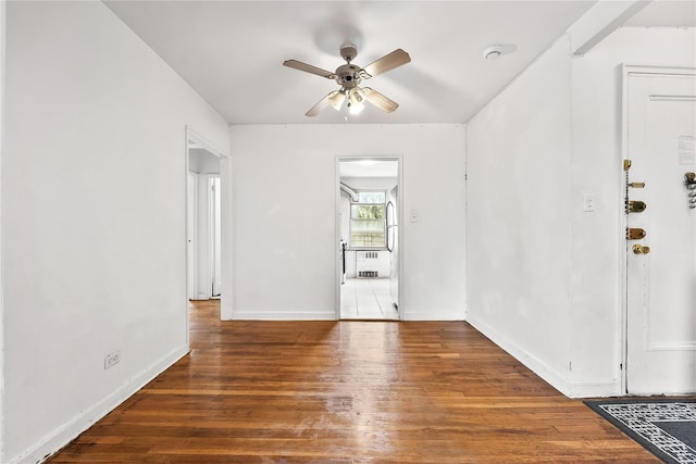 147-25 38th Ave Unit F26, Flushing, NY 11354 - empty room with a ceiling fan, wood finished floors, and radiator heating unit