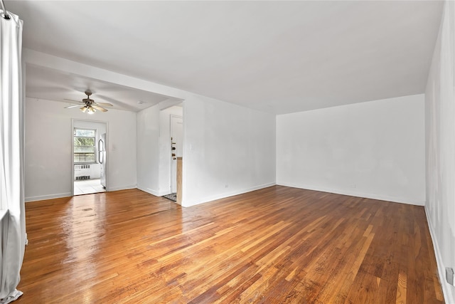 147-25 38th Ave Unit F26, Flushing, NY 11354 - unfurnished living room featuring light wood-type flooring and a ceiling fan