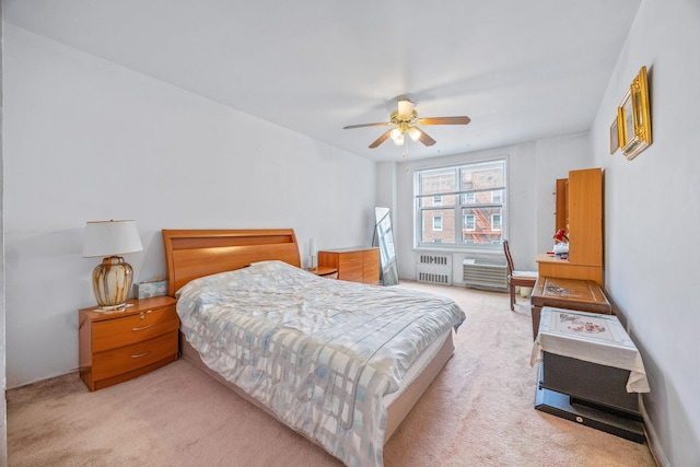 142-05 Roosevelt Ave Unit 627, Flushing, NY 11354 - carpeted bedroom with radiator heating unit and ceiling fan