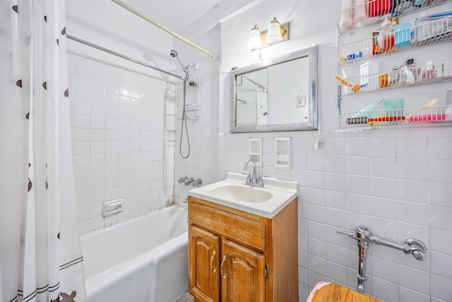 142-05 Roosevelt Ave Unit 627, Flushing, NY 11354 - bathroom with shower / tub combo, tile walls, and vanity