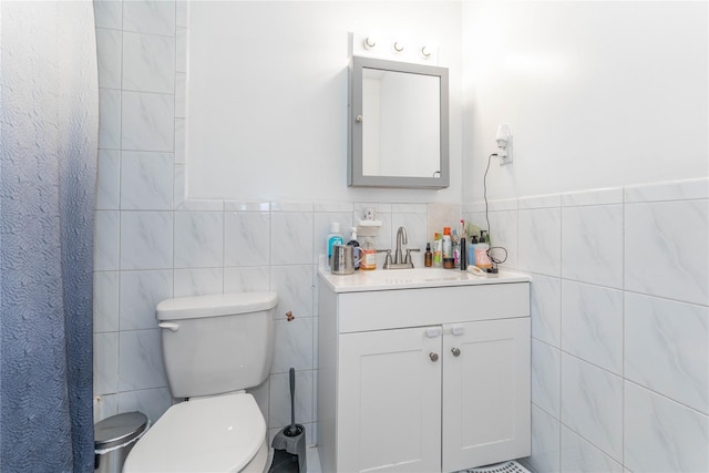 1051 Bay 32nd St, Bayswater, NY 11691 - full bathroom with tile walls, vanity, and wainscoting