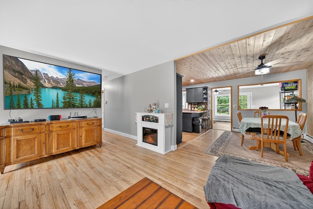 130 Marcus Rd, Ellenville, NY 12428 - living room with light wood-type flooring, ceiling fan, and wooden ceiling