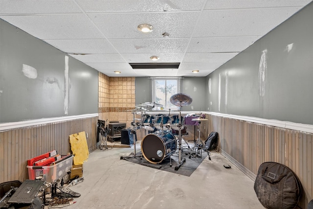 130 Marcus Rd, Ellenville, NY 12428 - exercise room featuring a wainscoted wall, a paneled ceiling, and wood walls