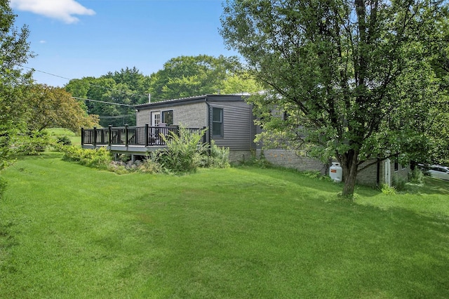 130 Marcus Rd, Ellenville, NY 12428 - view of grassy yard with a deck