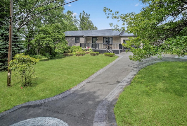 130 Marcus Rd, Ellenville, NY 12428 - ranch-style home featuring a front yard and a metal roof