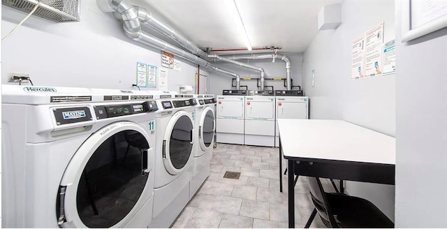 24120 Northern Blvd Unit 4C, Douglaston, NY 11362 - community laundry room with separate washer and dryer