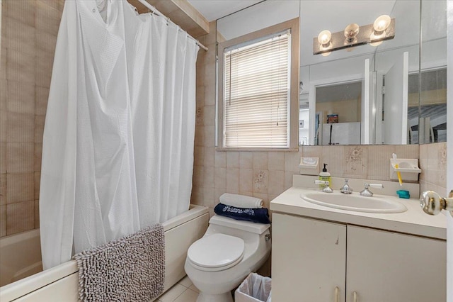 227 Randall Ave, Lawrence, NY 11559 - bathroom featuring vanity, shower / tub combo with curtain, and tile walls