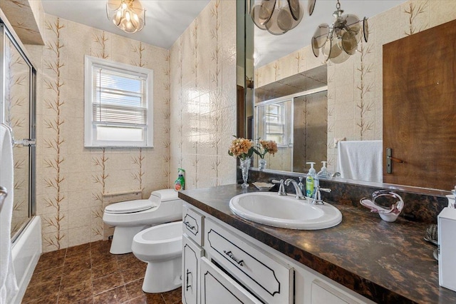 227 Randall Ave, Lawrence, NY 11559 - full bath with vanity, a bidet, and shower / bath combination with glass door