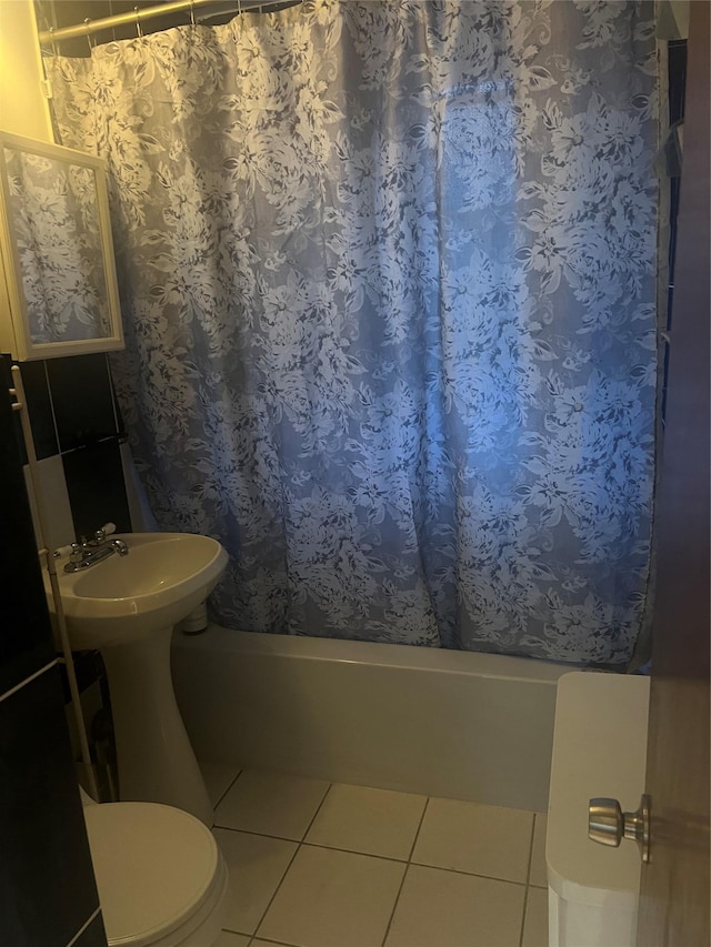 264-31 Langston Ave Fl 2Nd, Glen Oaks, NY 11004 - bathroom featuring shower / bath combination with curtain and tile patterned flooring
