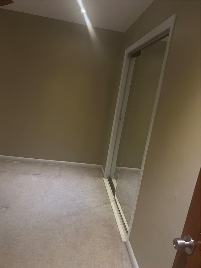 264-31 Langston Ave Fl 2Nd, Glen Oaks, NY 11004 - spare room featuring light carpet and baseboards