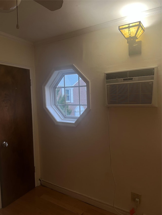 264-31 Langston Ave Fl 2Nd, Glen Oaks, NY 11004 - bonus room with a wall mounted air conditioner, wood finished floors, and a ceiling fan